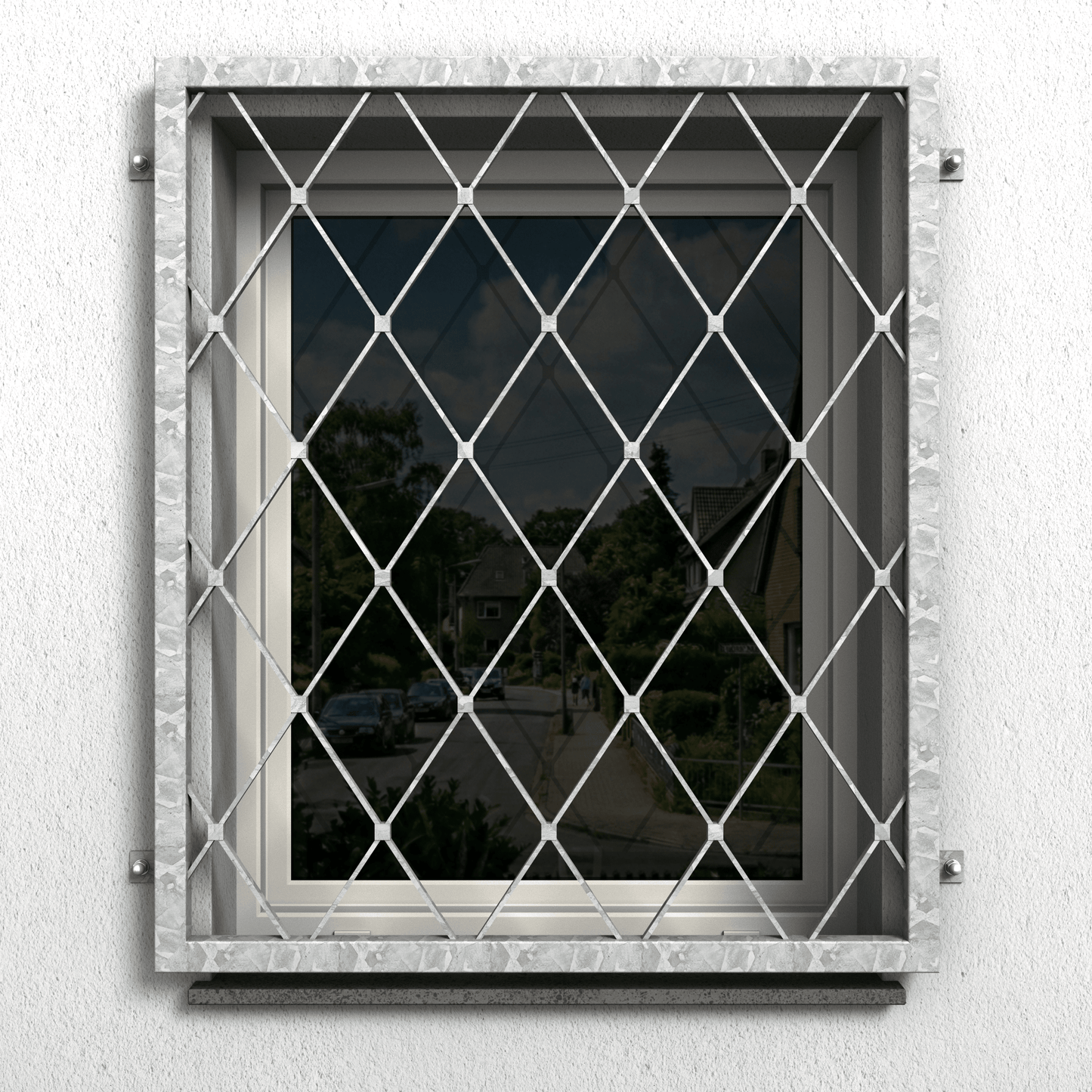 Fenstergitter aus feuerverzinktem Stahl mit gleichmäßigem Rautenmuster als Einbruchschutz am Fenster
