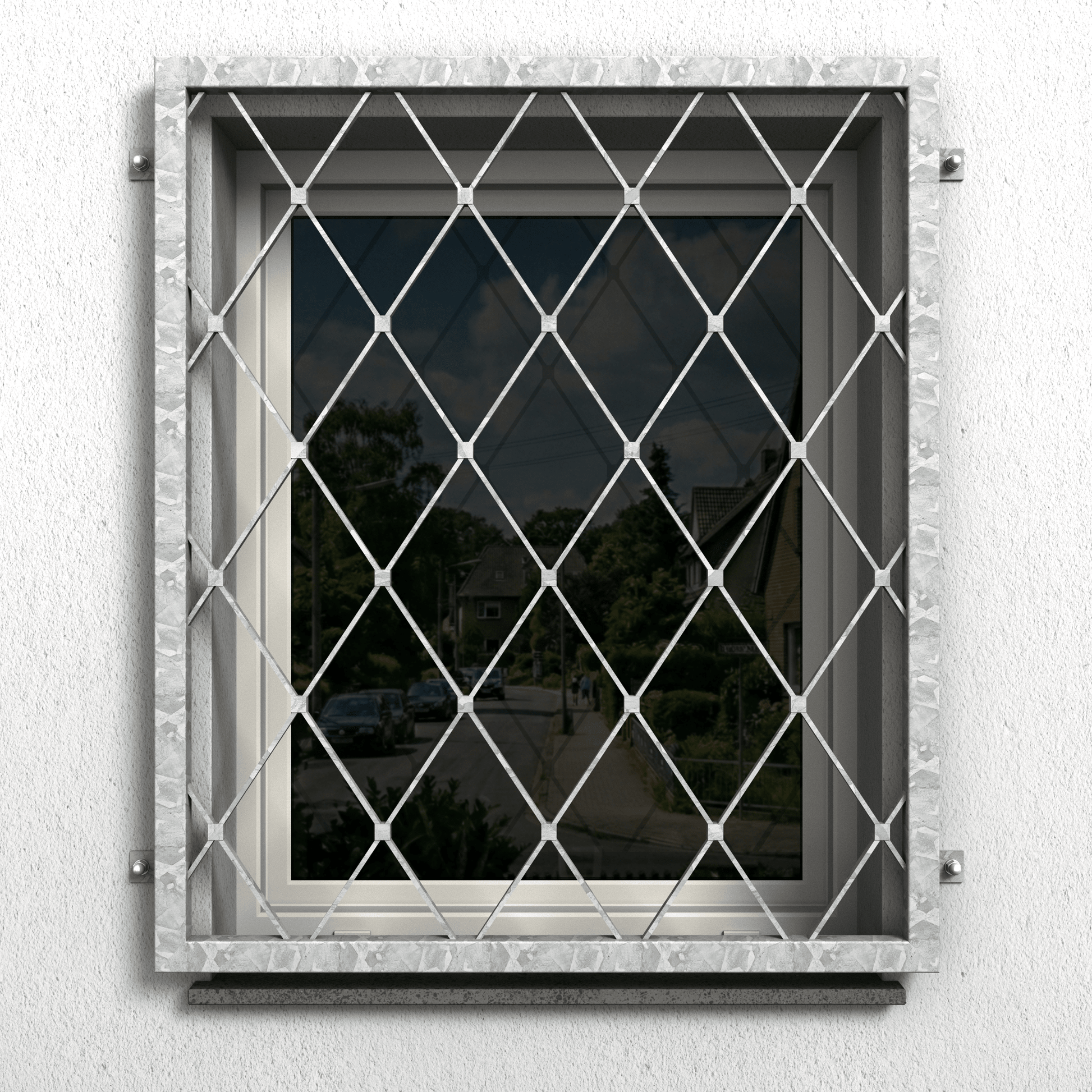 Fenstergitter aus feuerverzinktem Stahl mit gleichmäßigem Rautenmuster als Einbruchschutz am Fenster
