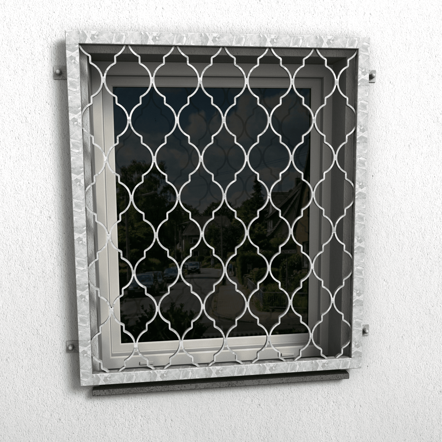 Fenstergitter aus feuerverzinktem Stahl mit dekorativem Ornamentmuster als Einbruchschutz am Fenster
