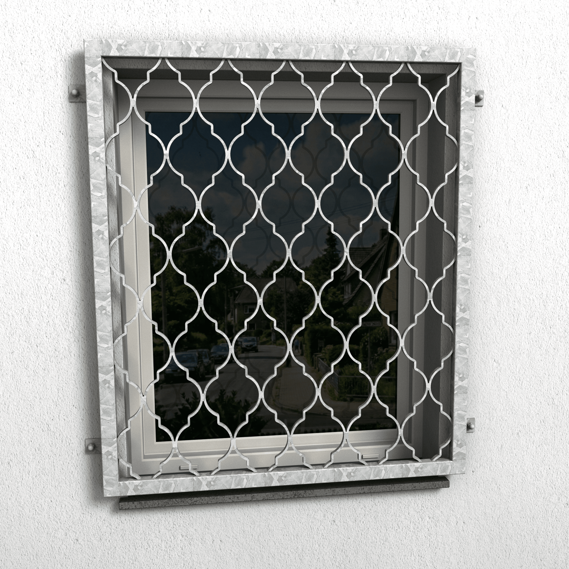 Fenstergitter aus feuerverzinktem Stahl mit dekorativem Ornamentmuster als Einbruchschutz am Fenster