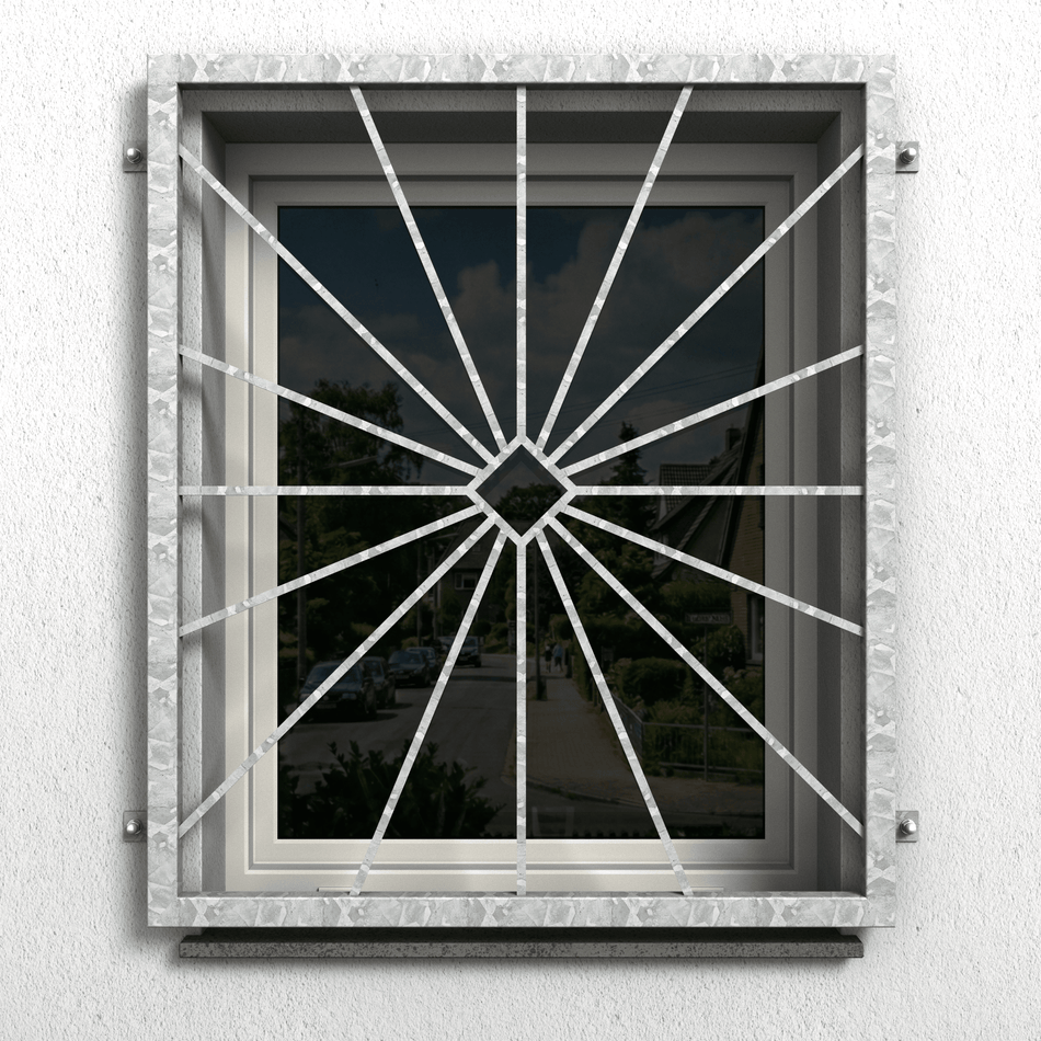 Fenstergitter Atlas 15 aus feuerverzinktem Stahl mit radialem Strahlenmuster als Einbruchschutz am Fenster